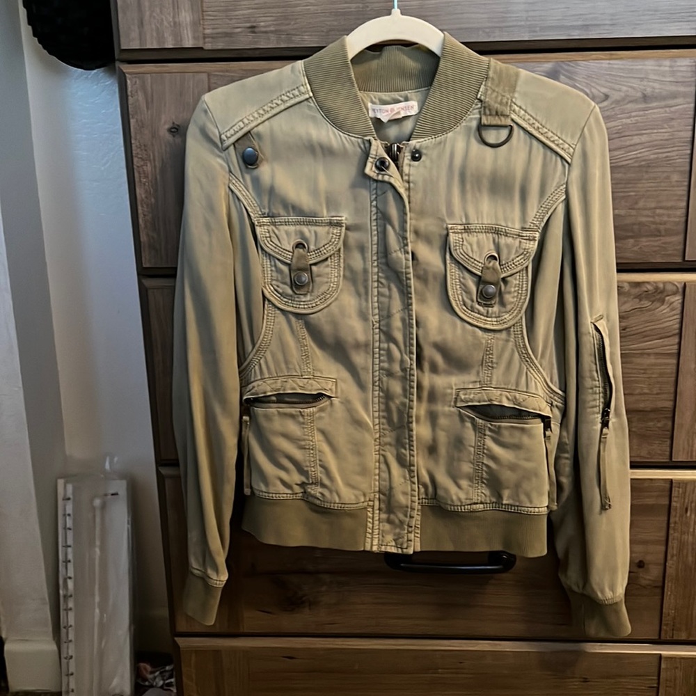 Green zip up jacket